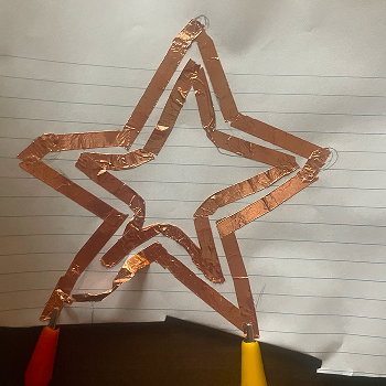 Connecting it to a single strip of copper tape on paper, testing whether a finger drag along the tape registers as a sustained keypress.